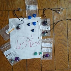 Necklaces with pendants that have chakra crystals inside to decrease stress.